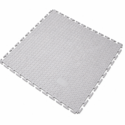 Gray interlocking pvc workshop garage floor tile on a white background